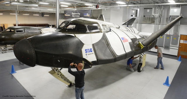 Technicians with the sub-orbital version of SNC's Dream Chaser
